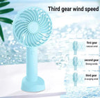 Portable Hand Fan – Mini Rechargeable Desktop Cooling Fan (Random Color) DailyDwell.pk