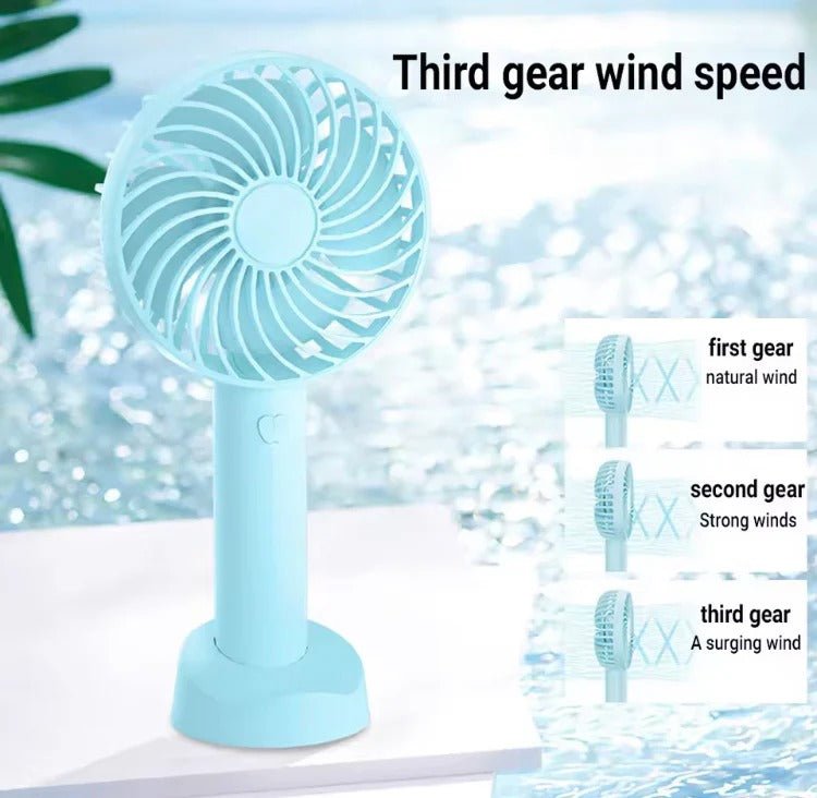 Portable Hand Fan – Mini Rechargeable Desktop Cooling Fan (Random Color) DailyDwell.pk