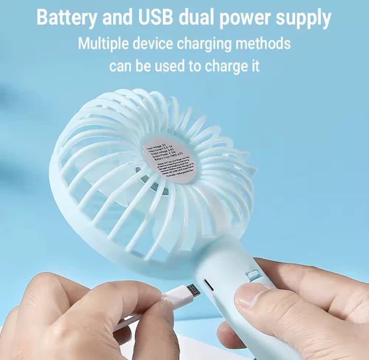 Portable Hand Fan – Mini Rechargeable Desktop Cooling Fan (Random Color) DailyDwell.pk