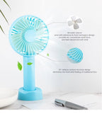 Portable Hand Fan – Mini Rechargeable Desktop Cooling Fan (Random Color) DailyDwell.pk