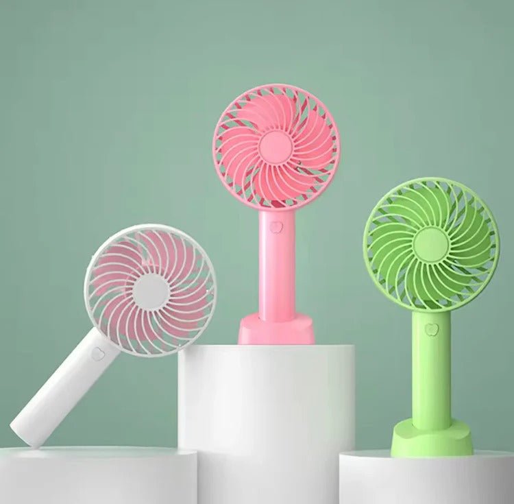 Portable Hand Fan – Mini Rechargeable Desktop Cooling Fan (Random Color) DailyDwell.pk