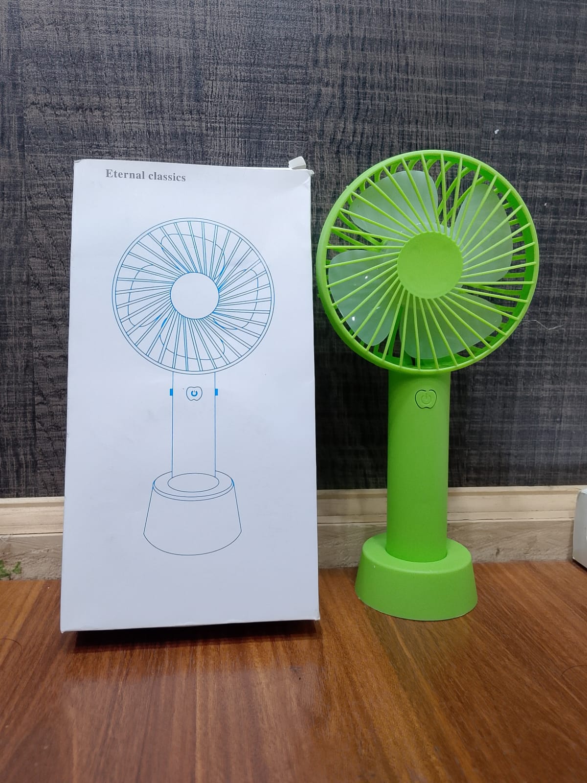 Portable Hand Fan – Mini Rechargeable Desktop Cooling Fan (Random Color) DailyDwell.pk